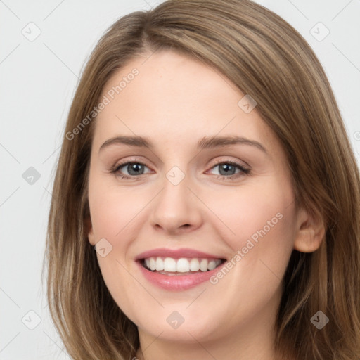 Joyful white young-adult female with long  brown hair and green eyes