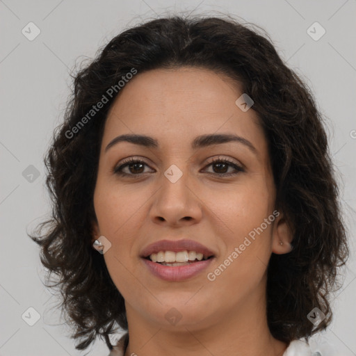 Joyful latino young-adult female with long  brown hair and brown eyes