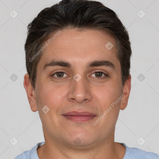 Joyful white adult male with short  brown hair and brown eyes