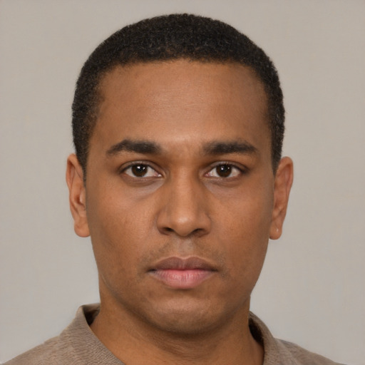 Neutral latino young-adult male with short  brown hair and brown eyes