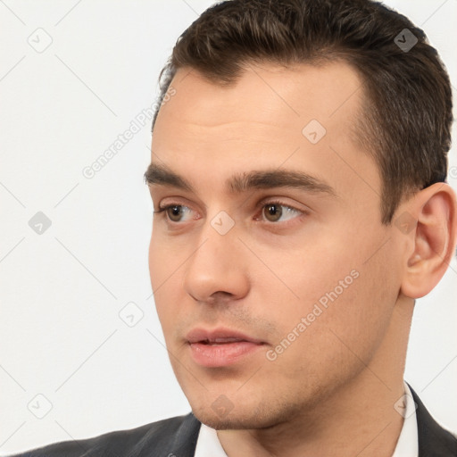 Neutral white young-adult male with short  brown hair and brown eyes