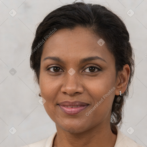 Joyful latino young-adult female with medium  brown hair and brown eyes