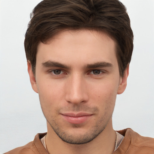 Neutral white young-adult male with short  brown hair and brown eyes