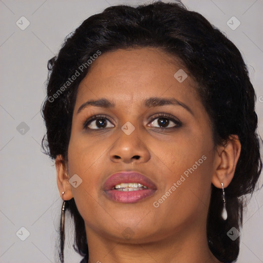 Joyful black young-adult female with medium  brown hair and brown eyes