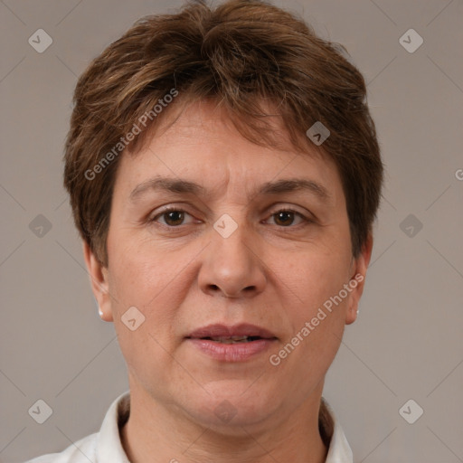 Joyful white adult female with short  brown hair and grey eyes