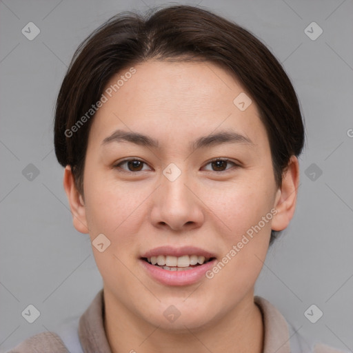 Joyful asian young-adult female with short  brown hair and brown eyes