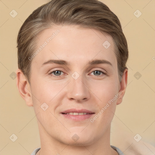 Joyful white young-adult male with short  brown hair and grey eyes