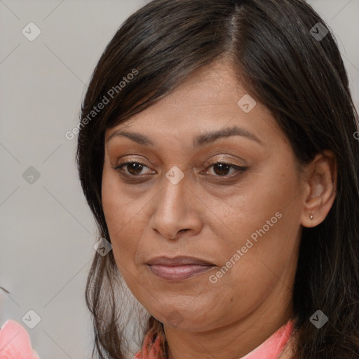 Joyful white adult female with medium  brown hair and brown eyes