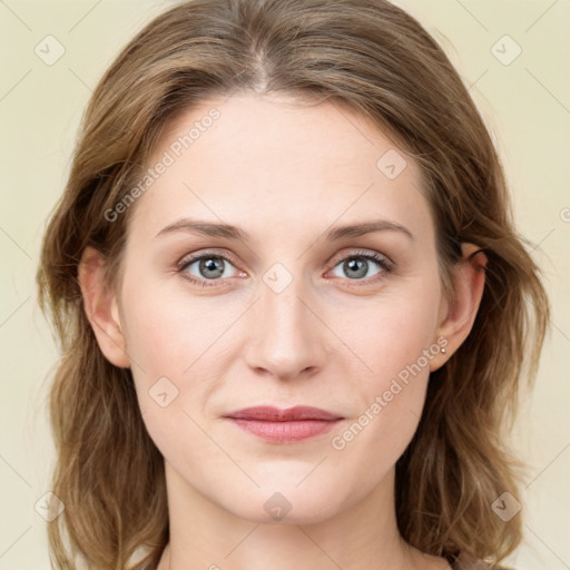 Joyful white young-adult female with medium  brown hair and blue eyes