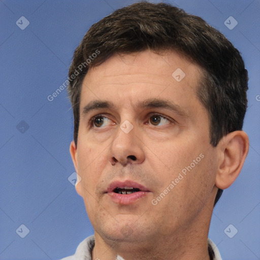 Neutral white adult male with short  brown hair and brown eyes