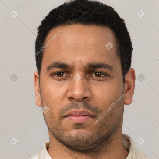 Neutral white young-adult male with short  black hair and brown eyes