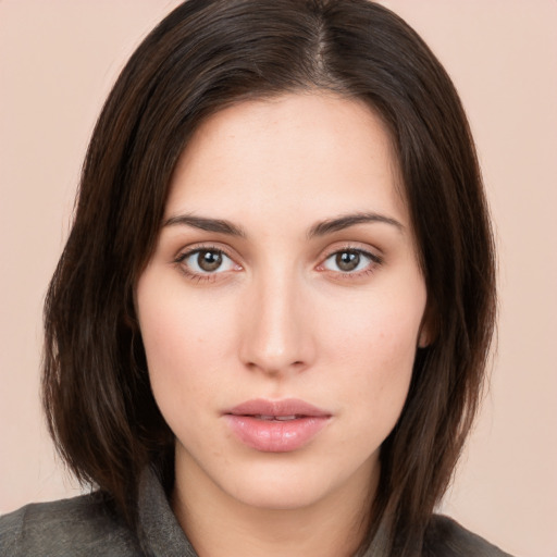 Neutral white young-adult female with medium  brown hair and brown eyes