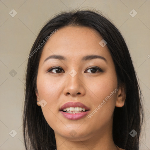 Joyful asian young-adult female with long  brown hair and brown eyes