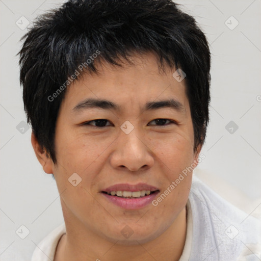 Joyful asian young-adult male with short  brown hair and brown eyes