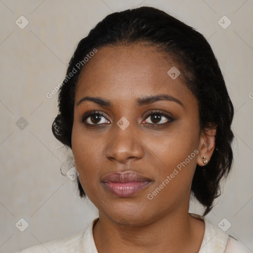 Joyful black young-adult female with medium  black hair and brown eyes