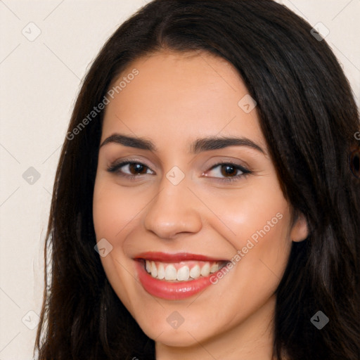 Joyful white young-adult female with long  black hair and brown eyes