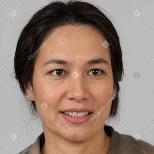 Joyful white adult female with medium  brown hair and brown eyes