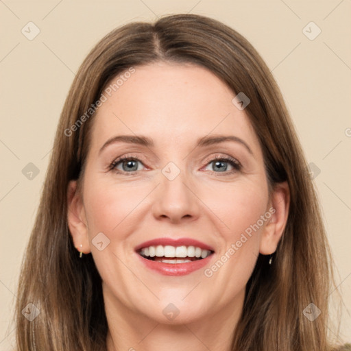 Joyful white young-adult female with long  brown hair and grey eyes