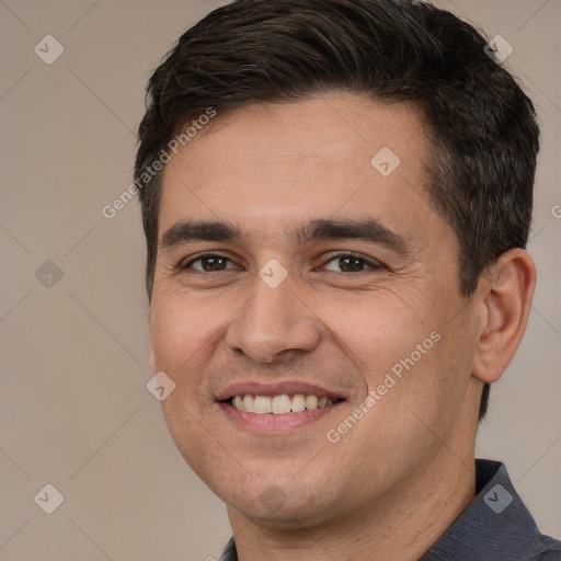 Joyful white young-adult male with short  brown hair and brown eyes