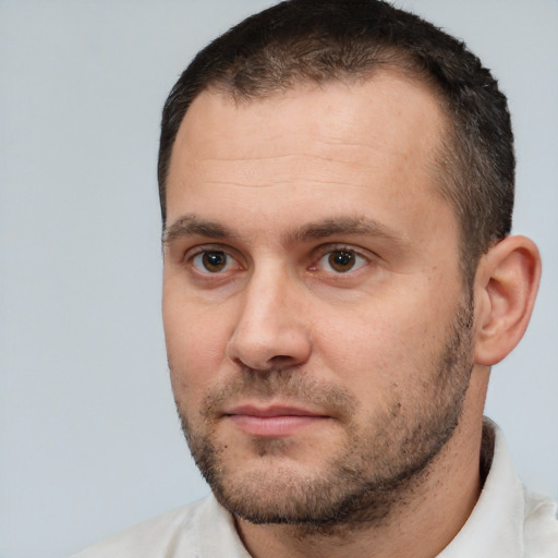 Neutral white adult male with short  brown hair and brown eyes