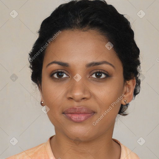 Joyful black young-adult female with medium  brown hair and brown eyes