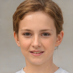 Joyful white child female with short  brown hair and brown eyes