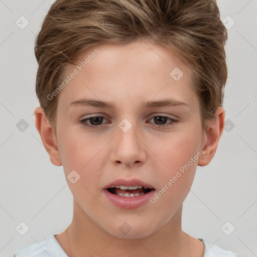 Joyful white child female with short  brown hair and brown eyes