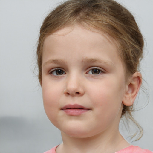 Neutral white child female with medium  brown hair and brown eyes