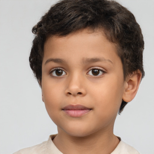 Neutral latino child male with short  brown hair and brown eyes