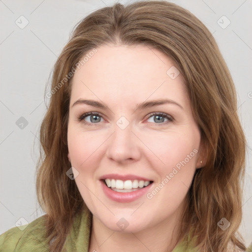 Joyful white young-adult female with medium  brown hair and green eyes