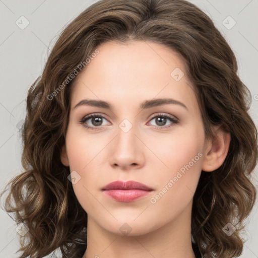 Neutral white young-adult female with long  brown hair and brown eyes