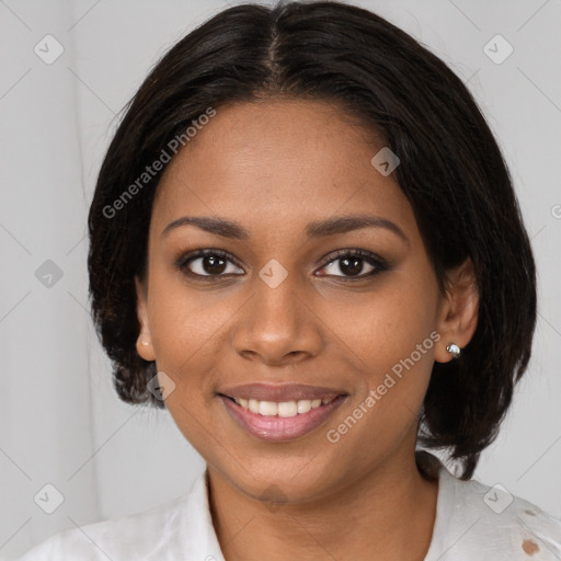 Joyful black young-adult female with medium  brown hair and brown eyes