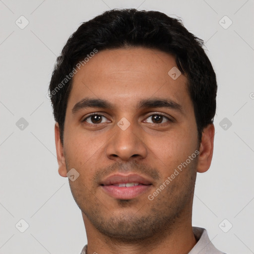 Neutral latino young-adult male with short  black hair and brown eyes