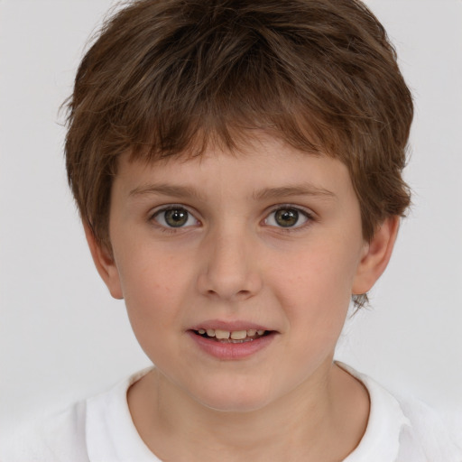 Joyful white child male with short  brown hair and brown eyes