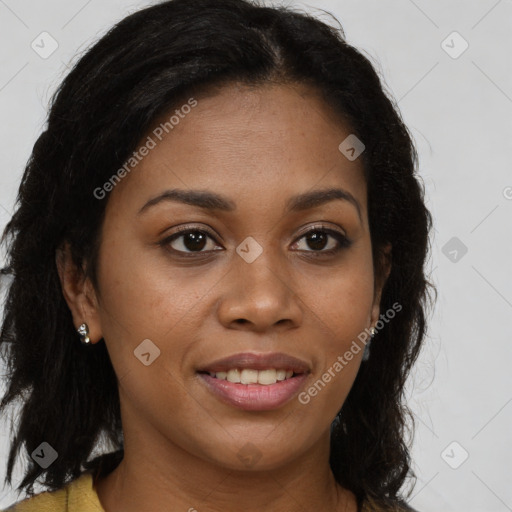 Joyful black young-adult female with long  brown hair and brown eyes
