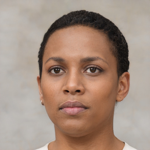 Neutral black young-adult female with short  black hair and brown eyes