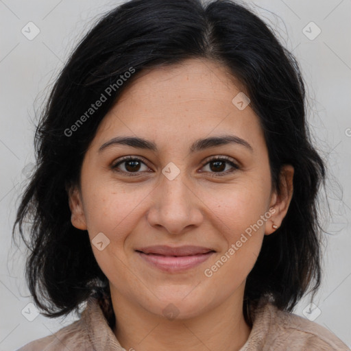 Joyful white adult female with medium  brown hair and brown eyes