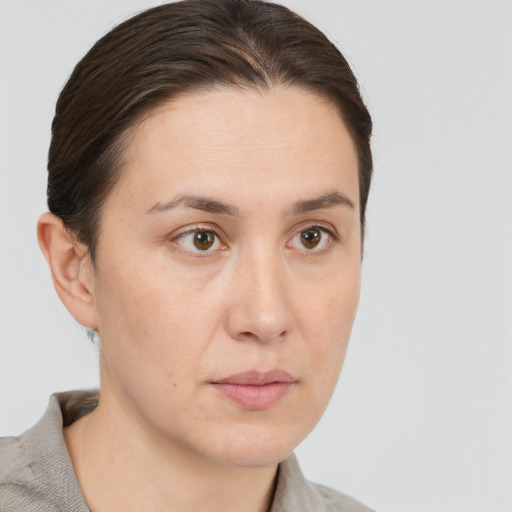 Neutral white young-adult female with short  brown hair and brown eyes