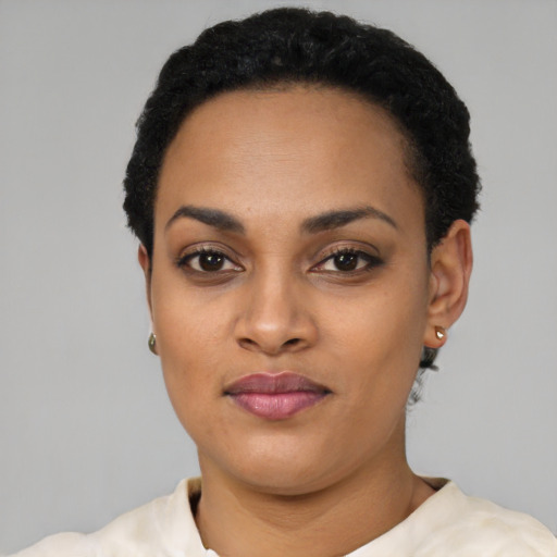 Neutral black young-adult female with short  black hair and brown eyes