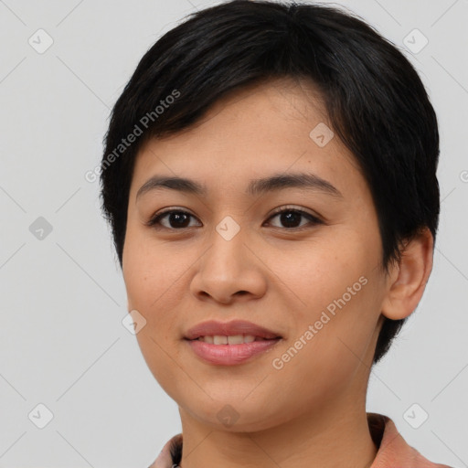 Joyful asian young-adult female with short  black hair and brown eyes