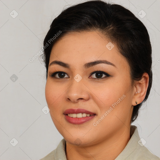 Joyful asian young-adult female with medium  brown hair and brown eyes