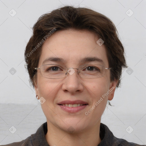 Joyful white adult female with short  brown hair and brown eyes