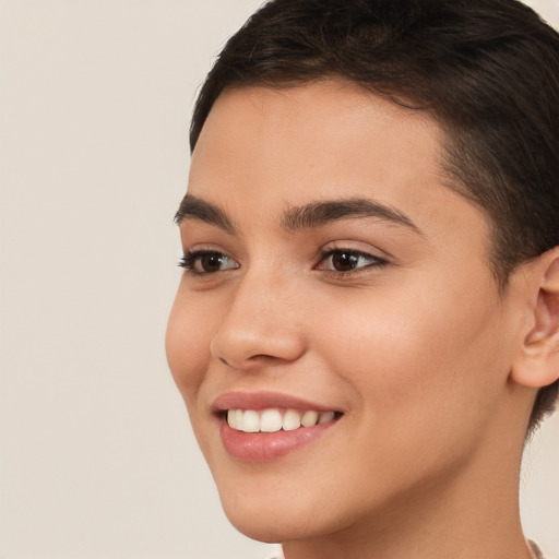 Joyful white young-adult female with short  brown hair and brown eyes