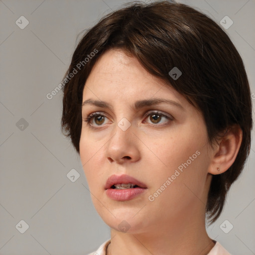 Neutral white young-adult female with medium  brown hair and brown eyes