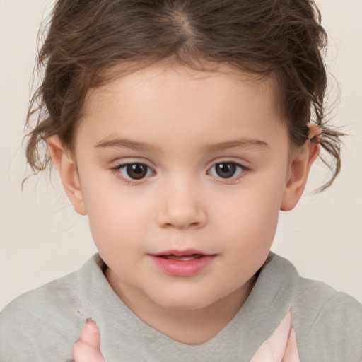 Neutral white child female with short  brown hair and brown eyes