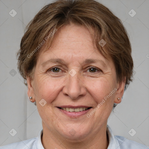 Joyful white adult female with short  brown hair and brown eyes