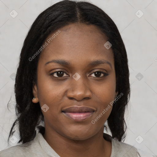 Joyful black young-adult female with medium  black hair and brown eyes