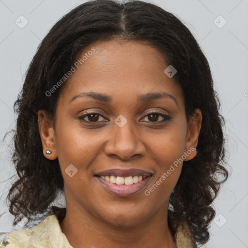 Joyful black young-adult female with medium  brown hair and brown eyes