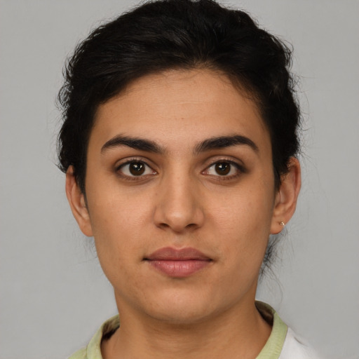 Neutral latino young-adult female with short  brown hair and brown eyes