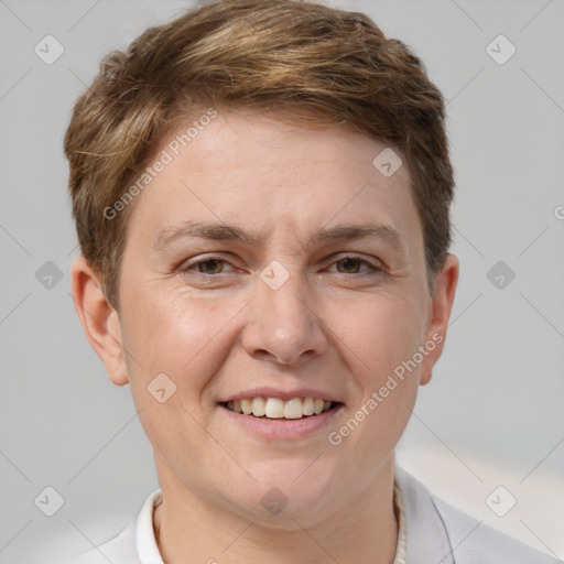 Joyful white adult female with short  brown hair and grey eyes